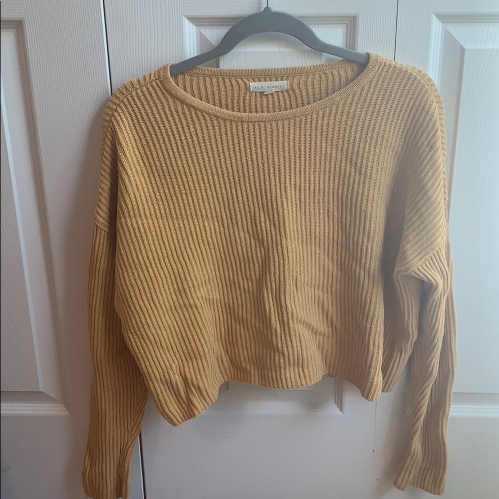 Crew neck sweater.